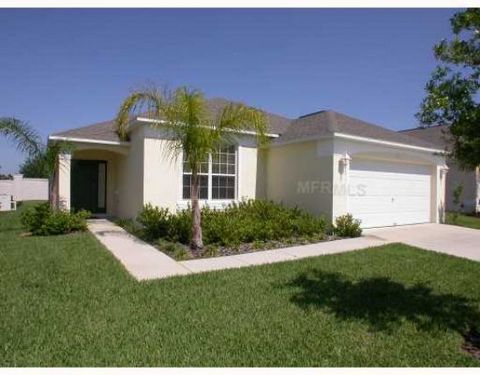 Nicely furnished 4 bed / 3 bath home in gated community.  Close to Disney, shopping and local restaurants.  One of the few communities in Central Florida where you can actually walk to the grocery store, 24hr. Wal-Mart and restaurants. Southern Dunes...
