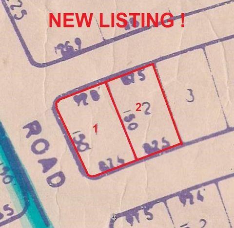 These side by side lots are located in the gated community of Queen's Cove. They are multi-family lot and ready to build on, with all utilities in place.