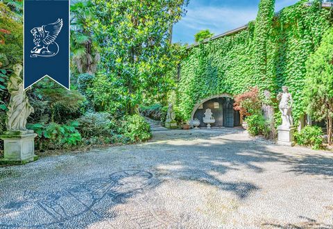 This designer villa for sale is in a prestigious residential area on the rolling hills of the Brianza area, by Lake Lecco. Immersed in a private park of 1.5 hectares, this luxury property offers a spectacular sweeping view from the skyline of Milan t...