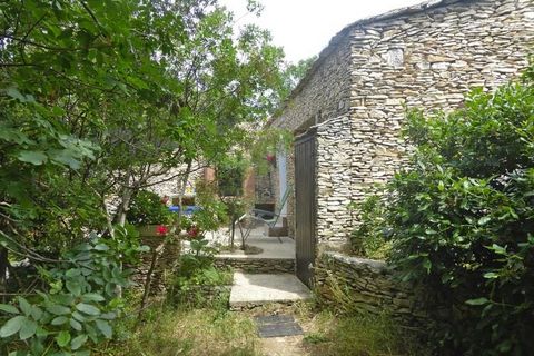 Hidden natural stone house for two on a rustic, enclosed natural plot on a slope (1,300 sqm), overgrown with wild herbs and Mediterranean oaks. Ideal for outdoor dining is the south-facing terrace with barbecue area and view of the neighbouring villa...