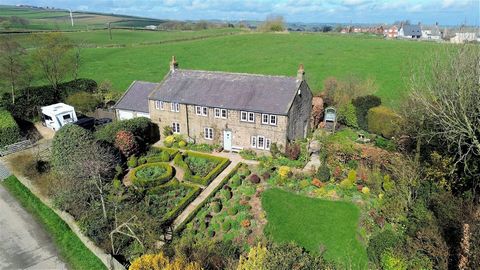 A delightful cottage, set within 1/3 of an acre grounds, commanding stunning views over open countryside, sympathetically renovated retaining original period features, offering spacious 4 bedroom accommodation resulting in the most idyllic of family ...