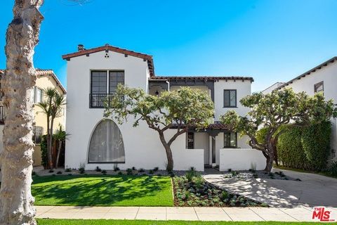 Charming and spacious 1929 Spanish Inspired Duplex in prime Beverly Hills-just one short block from Roxbury Park. The units feature hardwood floors, updated kitchens with stainless appliances, inside private laundry in each unit and a special bonus r...