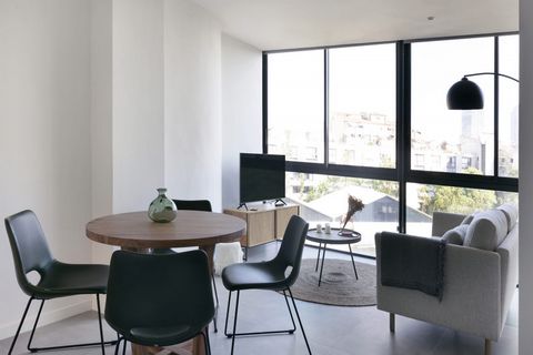 Bright Oasis is a multiunit with 10 one-bedroom apartments located in Poble Nou, 4 blocks from the beach. The unit shows an open concept layout with plenty of natural nights thanks to the big window wall. Upon entering, you’ll be met by the living ar...