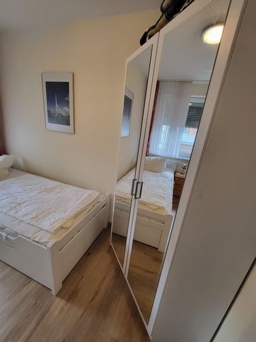 The apartment has a large living-dining room with a fitted kitchen. The apartment has one bedroom with a double bed. In the other bedroom there is a pull-out bed. A lying surface is 2 meters long, the extending lying surface is 1.90 meters. The apart...