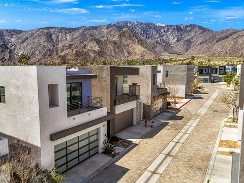 The epitome of architecture + ''Palm Springs Style,'' this contemporary solar-powered home showcases its recently constructed sparkle combined with a hint of mid-century flare. Enter through an alluring passage leading to the front door as well as to...