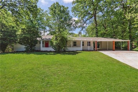 This completely renovated home is in an established Decatur neighborhood. This home sits on a large level lot and has been completely renovated throughout with beautiful finishes and thoughtful design. The property features 4 bedrooms and 3 full bath...