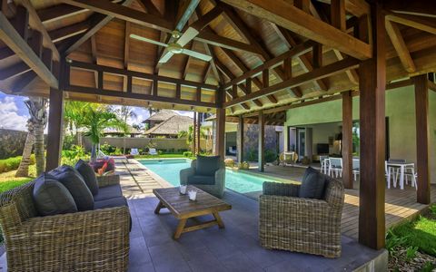 4 bedroom villa for sale in Grand Gaube, Mauritius – Enjoy the sweetness of life and tranquility in a villa located in the enclosed and secure domain of Mythic Suites & Villas. A few minutes from the famous seaside resort of Grand Bay and only 550 me...
