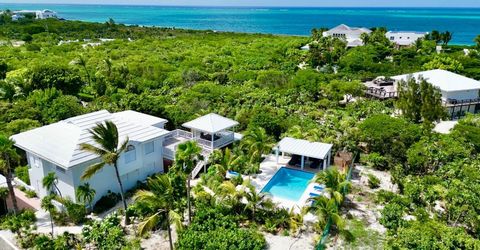 What a location! The Grace Bay Beach access path is steps from this spacious 2 storey villa, with pool and well maintained grounds. It is gated and fenced and enjoys lush tropical landscaping. The floor plan is open and bright and flows easily making...