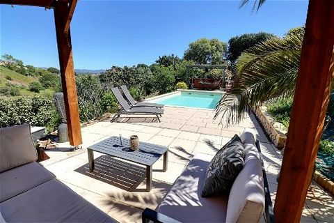 Stylish modern villa in a beautiful dominant position on the heights above Roquebrune sur Argens with a splendid view over the village and the countryside. Situated in a spacious urban area with its garden bordering on a natural area, giving the prop...