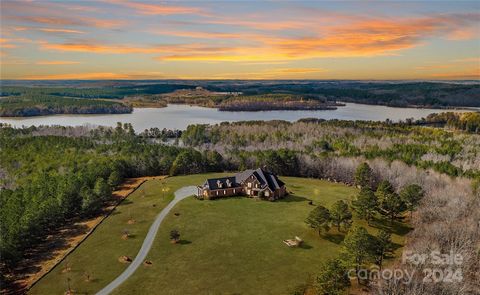 Exclusive Opportunity to purchase the Tuckertown Estate with choice of 50 acres AND 3600sqft shop! Buyer now has the opportunity to draw lot lines and enjoy this exquisite property! With 9000sqft+, this custom built property overlooks the National Fo...