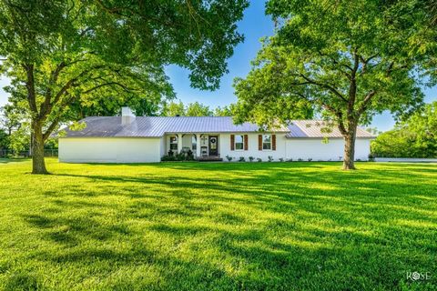 Discover your oasis nestled on 7.45 acres, where the Concho River forms a picturesque backdrop, complete with a boat pier for river adventures. This remodeled home boasts a split floor plan and also features a 3-car garage, a barn, and additional out...