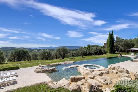 Located in a quiet area, on the hills of Châteauneuf-Grasse with a breath-taking sea view, this majestic bastide offers a landscaped grounds planted with olive trees, a 24 meters swimming pool with jacuzzi and waterfall. The property combines Provenç...