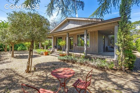 Updated modern St. Helena bungalow that exudes style and charm. The 2 bedroom 2 bath with California-casual floor plan, fabulous open concept kitchen with top of the line appliances and center island, open beam wood ceilings, a cozy fireplace, and Fr...