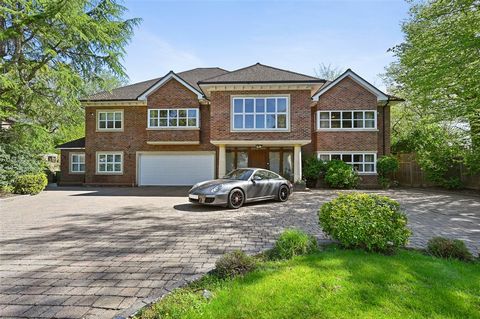 Imposing modern home built in 2008 with meticulous attention to detail and high-quality finishes. Spacious double-height reception hallway leading to a drawing room, bar, and formal dining room with access to patio and gardens. Well-appointed kitchen...