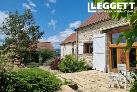 A28751ABR03 - This immaculate barn conversion sits on a 4415 m2 plot with stunning views. It offers 230 m2 of living space, including an independent apartment, workshop, carport, and covered terrace. The ground floor features a spacious living room w...