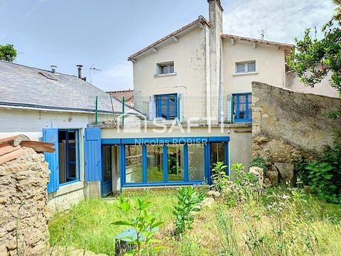Maison de ville en pierre cinq chambres et jardin proche gare TGV et commerces !!