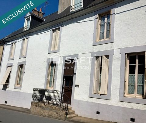 Grande maison avec vaste terrain au coeur du village