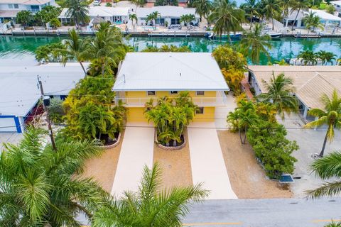 Seller Financing Available, Weekly rentals allowed, 6beds, 4baths, over 3296 sf, Tropical landscape and large pool, New Impact windows and doors coming soon will be done prior to closing. Clean, easy to show, Big boat dockage with 75 ft seawall and 1...