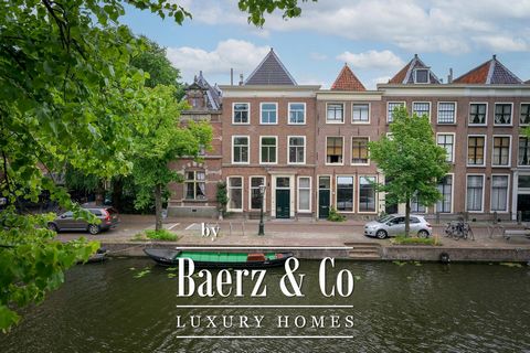 In a very privileged location beside one of the most beautiful canals of Leiden lies this stately mansion from the first half of the 18e century. This property combines a number of exceptional features that are very hard to find in the centre of Leid...
