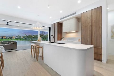 Introducing a slice of coastal paradise, nestled along the shimmering water's edge, this brand new build embodies the epitome of luxury living with a modern Palm Springs-inspired flair. This brand new build sets the standard for luxury living with it...
