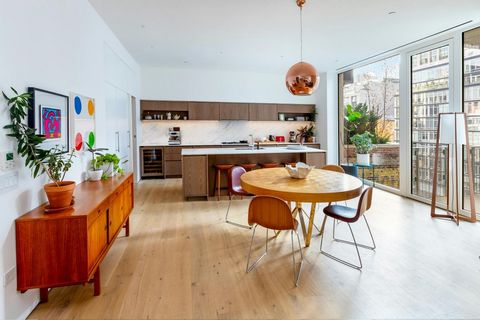 Residence 7- a private home at 532 West 20th Street is an exquisitely crafted 2703 SF full-floor home featuring three bedroom, three full baths plus a powder room and a 155 SF southern facing terrace directly off the vast great room with exciting cit...