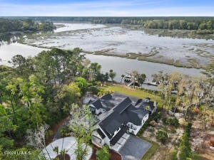 The ONLY home of its kind! The epitome of ''State of Mind'' Living! Designed by famed Architect, John Pittman III. No Expense spared in the design details, quality, construction materials or fixtures/finishes. Built in 2023 on 2.6 Ac. w/ a 30' long D...