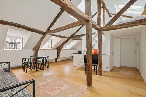 Paris 7th stylish character apartment with modern features Overlooking the Matignon gardens and the rue de Babylone, on the 4th and top floor of a beautiful 1850 building with a paved courtyard, this delightful 3-room apartment was completely renovat...