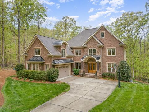 Stunning Estate Sanctuary on almost 4 Acres. Completely Private and Secure. Nestled in the woods of Lystra Estates, minutes from Downtown Chapel Hill. Horses Allowed! This Custom Built Home Offers Stunning Refinished Hardwoods, New Carpet, Completely...