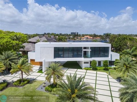 Experience the epitome of waterfront luxury with this stunning ultra-modern estate in the exclusive gated community of Sea Ranch Lakes, renowned for its private beach club, dedicated police force, and spectacular intracoastal views. This architectura...