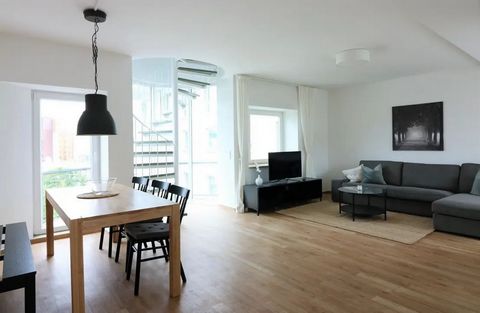 This lovingly furnished maisonette apartment is located in the vibrant heart of Berlin. On the lower floor of the apartment, a spacious living room awaits you, with a dining area, a reading corner and an open-plan kitchen. In addition, there is a gue...