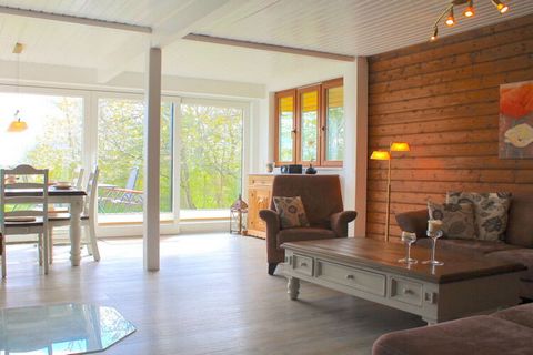 Our 95sqm large and rustic yet modern and lovingly furnished log cabin offers pure cosiness. A rustic and modern house awaits you, in a quiet location with a large garden. Another special feature is our living and sleeping studio on the 1st floor wit...