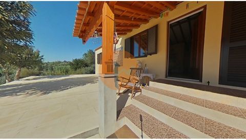 3-Bedroom House in Padrão-Lousã This single-story house is situated on a plot of land measuring 980 square meters and offers a range of amenities. The house comprises three bedrooms, including a master bedroom with an en-suite bathroom, along with th...