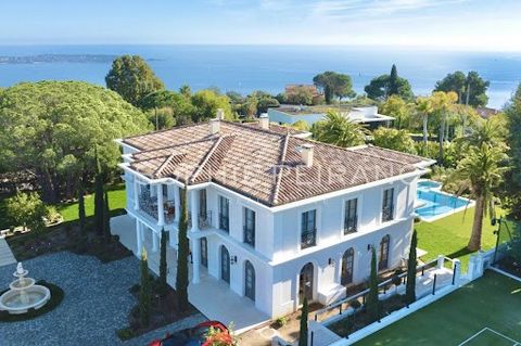 On the residential hillside of Super Cannes, in absolute calm, superb recently-built villa with luxury features with sea view. Set on a flat plot of 3200m2 with heated pool and tennis court. The villa comprises a large reception hall, living room wit...