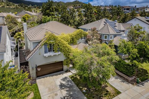 Welcome home to your dream oasis in the prestigious gated community of Promontory Ridge. Nestled within the sought-after San Elijo Hills, this stunning home boasts a captivating vine-covered facade that adds an enchanting touch to its curb appeal. In...