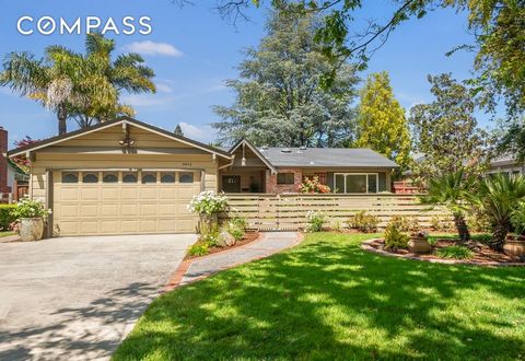 Darling home in a desirable Campbell neighborhood! Warm and inviting upon entering, this single-story home offers an open living area, gleaming hardwood floors and an abundance of natural light. Beautifully manicured front and back yards with colorfu...