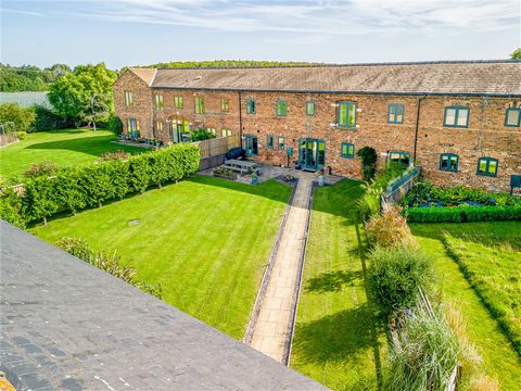 An immaculate equestrian barn conversion offers light, space and modern living combined with character from the past, and provides 4 bedrooms upstairs and large reception spaces downstairs including a dual aspect kitchen dining room and living room, ...
