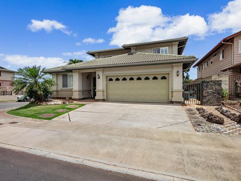 Welcome to luxury living in Kapolei Knolls! Nestled on a corner lot, this exquisite 4 bedroom, 3 bathroom Single Family Home, a highly sought-after OPUS Model, presents an exceptional blend of comfort and convenience. Step into a meticulously cared f...