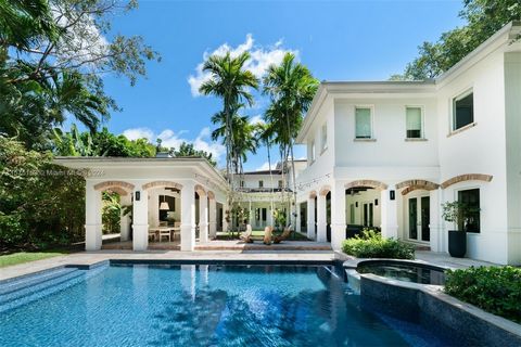On a sprawling 20,000 SF gated lot in an idyllic location just minutes away from Brickell, Key Biscayne, and Coconut Grove, this 8,881 SF, 6-BD, 6.5-BA residence offers a bright and airy ambiance, with abundant natural light cascading through volume ...