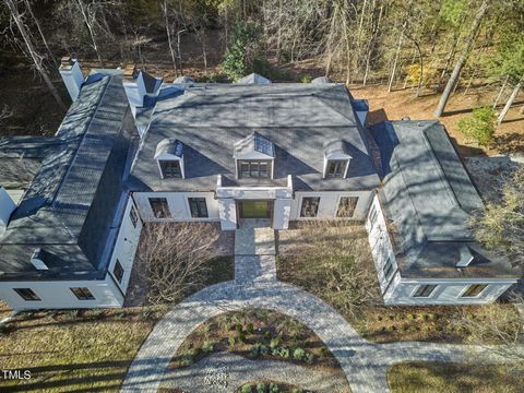 Welcome to La Maison, the epitome of luxury living in the heart of walkable Chapel Hill. Walk to UNC sports, restaurants, theaters. In the BEST school district! Enjoy tranquility/security of your own oasis on 0.65 acres.Step into the grand marble foy...