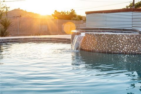 Welcome to this turnkey POOL HOME, with solar and sold fully furnished! Enjoy this 4 Bed, 2 Bath Airbnb Retreat with a sparkling pool in Yucca Valley's highly desired Sky Harbor neighborhood. Unwind by the sparkling pool, heated by a new pool heater ...