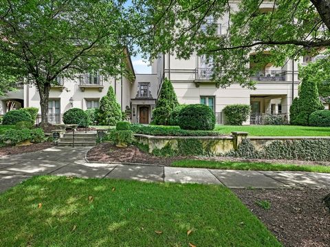 Beautiful Eastover Condominium that is well appointed with custom millwork, high ceilings, and spacious rooms. The French doors open to two separate terraces overlooking the private backyard and fountain. The Primary bedroom has complete privacy wher...