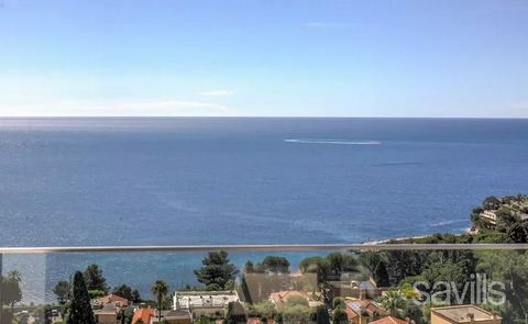 Contemporary villa located only 10 minutes from Monaco with panoramic sea views over the bay and at walking distance to the beach. The property is set out over three levels with an entrance hall opening onto a kitchen with family dining area with a c...