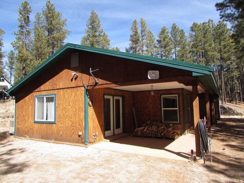 Beautiful, well maintained home located in the highly desirable Sierra Los Pinos subdivision just minutes from Los Alamos and Jemez Springs. This incredible home features a bright, open floor plan, ample storage, updated windows and a fourth Bedroom/...