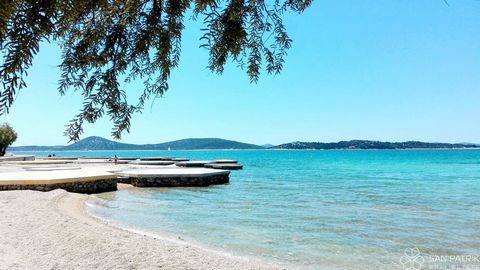 Discover your ideal vacation spot in the heart of Dalmatia! Just 60 meters from the crystal-clear sea, a modern apartment building is under construction, offering ten exclusive residential units. Its ideal location in Vodice, close to the popular cit...