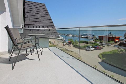 Enjoy the wonderful view over Lake Plauer: The newly built, high-quality and comfortably furnished terraced house with two balconies and a south-facing terrace is located directly at the sports boat harbor in the former fishing town of Plau am See an...