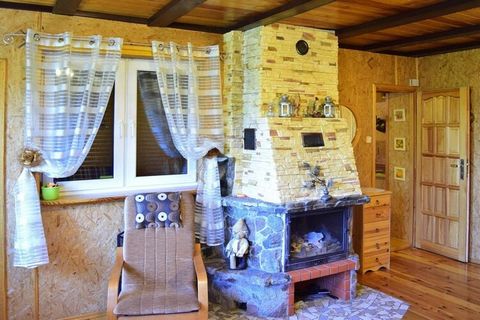 Lovingly furnished house with a beautiful garden. Beautifully situated in the middle of a quiet, wooded holiday home area, in the immediate vicinity of Lake Zawiat. The garden is ideal for barbecue and playing, a small winter garden also ensures a co...