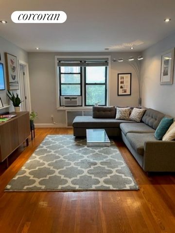 Welcome to 70 Park Terrace East! Apartment 2D is spacious, meticulous, and beautifully renovated. The main area of this inviting space has a living room with open western exposures, a sizable and fully-equipped windowed-kitchen, a wonderfully-designe...