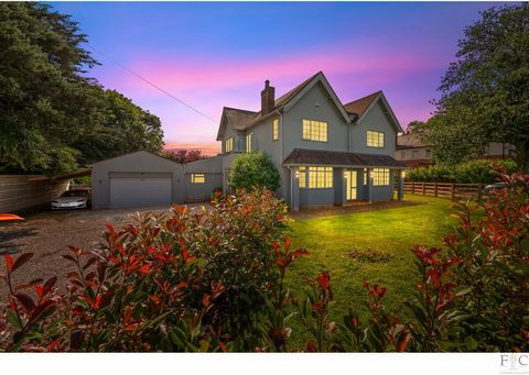 This delightful house may well have been designed with inspiration from colonial architecture. The notable gabled roof, white rendering, chimney stack, rectangular multi paned windows and pillared style porch combine to create an aesthetically pleasi...
