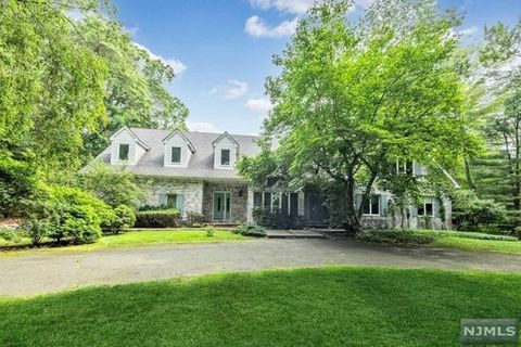 A true all brick Southern colonial on a magnificent , flat 2.53 acre parcel on a double cut-de-sac in the heart of Saddle River. This is a spacious 6 bedroom, 4 1/2 bath home with a very desirable barn and paddock, perfect for the equestrian or car c...