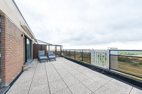 Rooftop flat located on the 10th floor and featuring 1 bedroom (double bed). There is a cosy bright living room (sofa bed for 2 persons) with a modern, open-plan kitchen. From the living room you have access to both spacious roof terraces (36 m2 + 40...